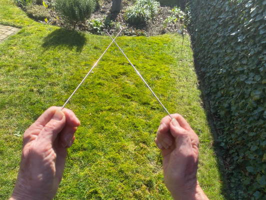 Natuurlijke uitstralingen en wichelroede